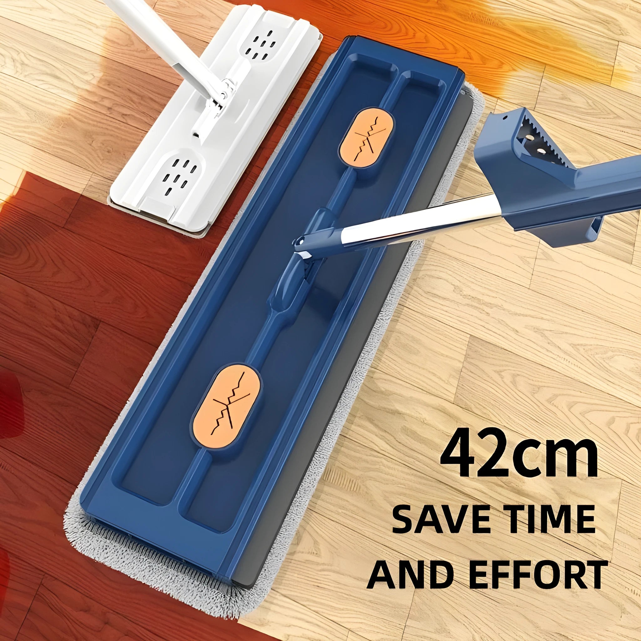 Large blue flat mop with a long stainless steel handle and a rotating head on a wooden floor.