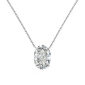 Close-up of a women's sterling silver necklace with a geometric oval ice flower pendant.