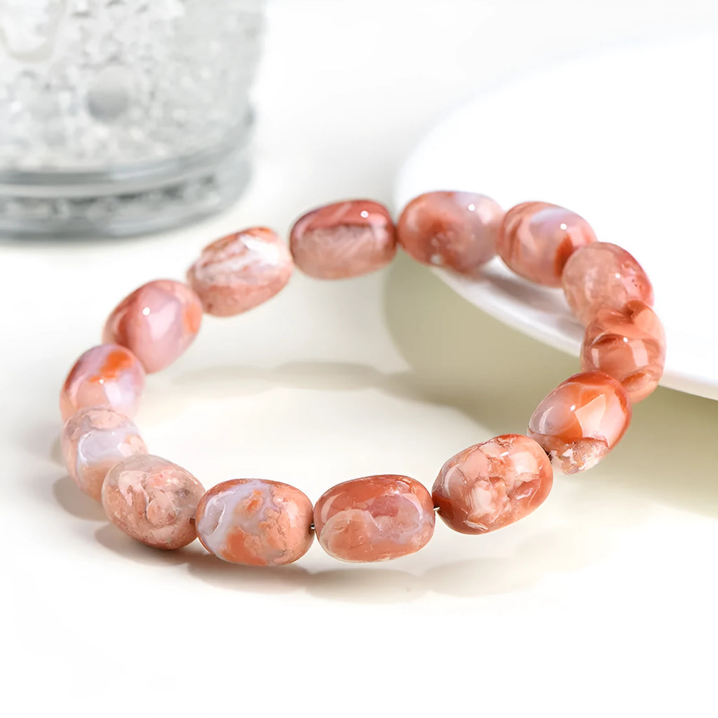 Natural cherry agate bracelet with 10x14mm barrel beads in geometric design
