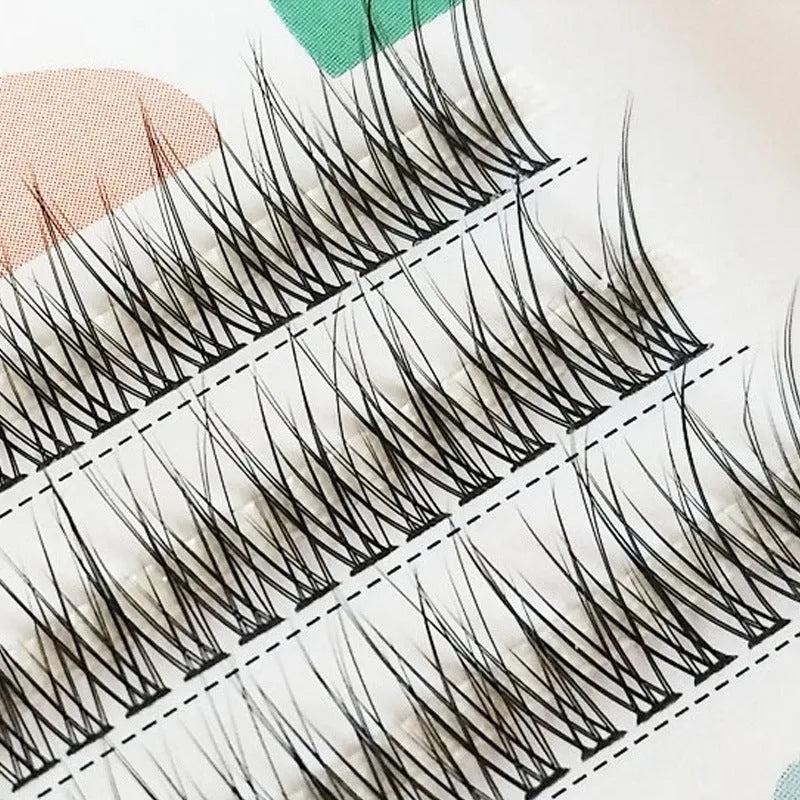 Black V-shaped fairy fishtail false eyelashes with thick segments in natural long style