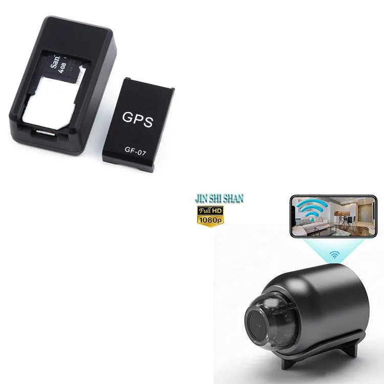 Small black magnetic GPS tracker device next to a USB charging cable on a table.