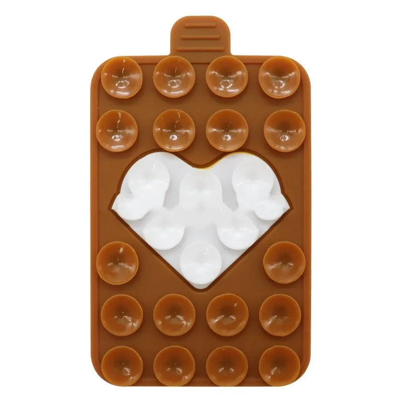 Double sided silicone suction cup phone case holder in gray white, showing hot pressed construction for universal fit on smooth surfaces