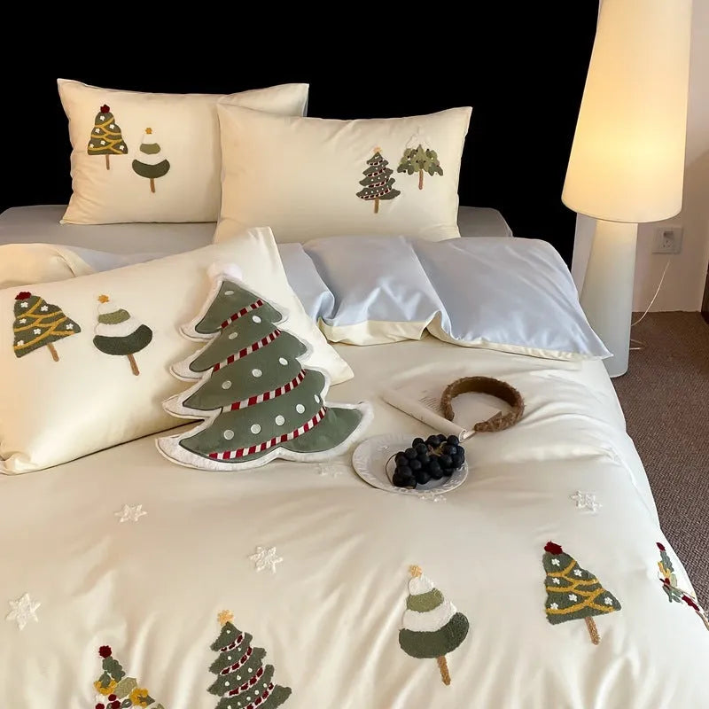 Cream Blue pure cotton duvet cover with raised white Christmas tree embroidery, paired with a fitted sheet and pillowcases.
