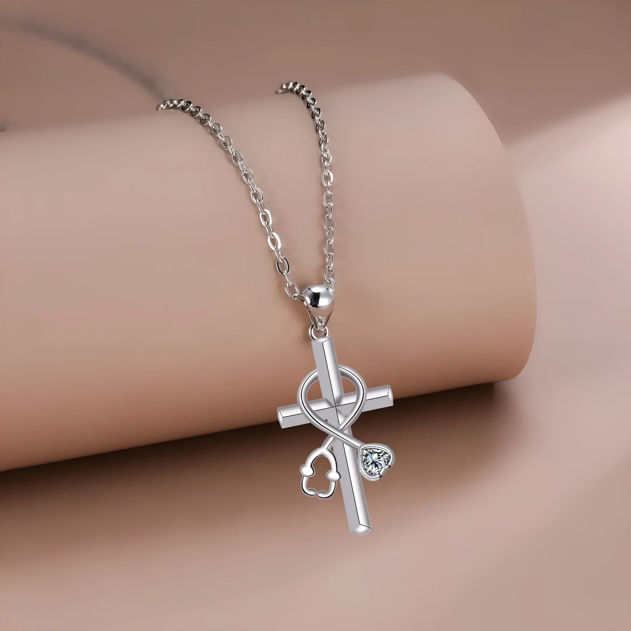 Women's copper electroplated necklace with stethoscope pendant on cross chain