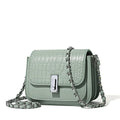 Soft black PU leather women's chain shoulder bag with adjustable strap and square shape.