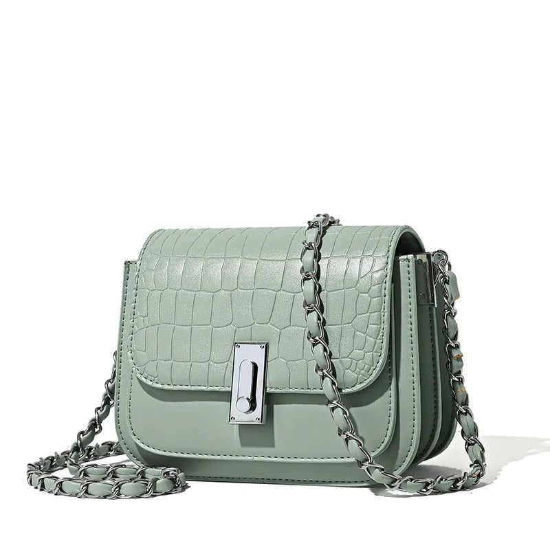 Soft black PU leather women's chain shoulder bag with adjustable strap and square shape.