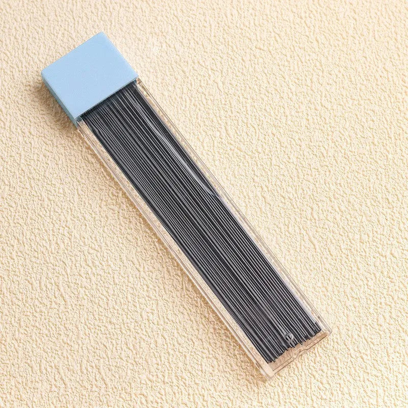 Automatic press pencil in peach colour with 0.5mm lead and refill set