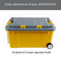 Large orange plastic storage box with wheels and an extended pull handle on a grey floor.