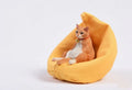 Lazy cat car ornament figure on fabric sofa, 7.5cm high resin model decoration.