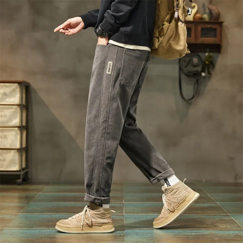 Men's corduroy casual trousers in tapered straight-leg design with street fashion styling