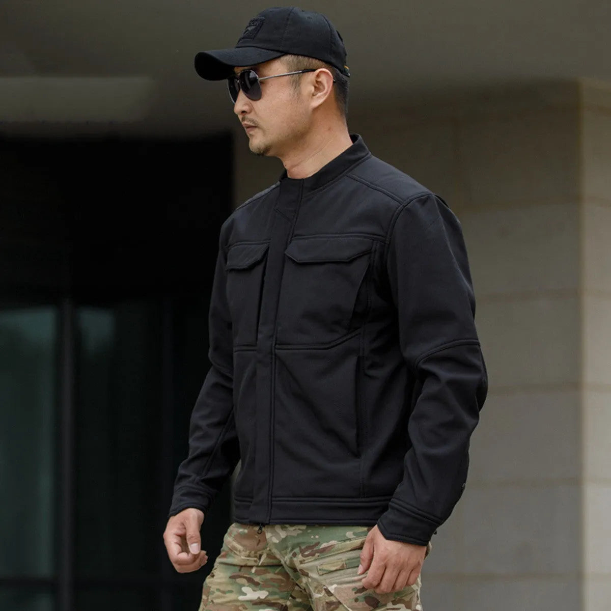 Bone Frog Peak Breaker soft shell jacket in black on a mannequin, showing cardigan style.