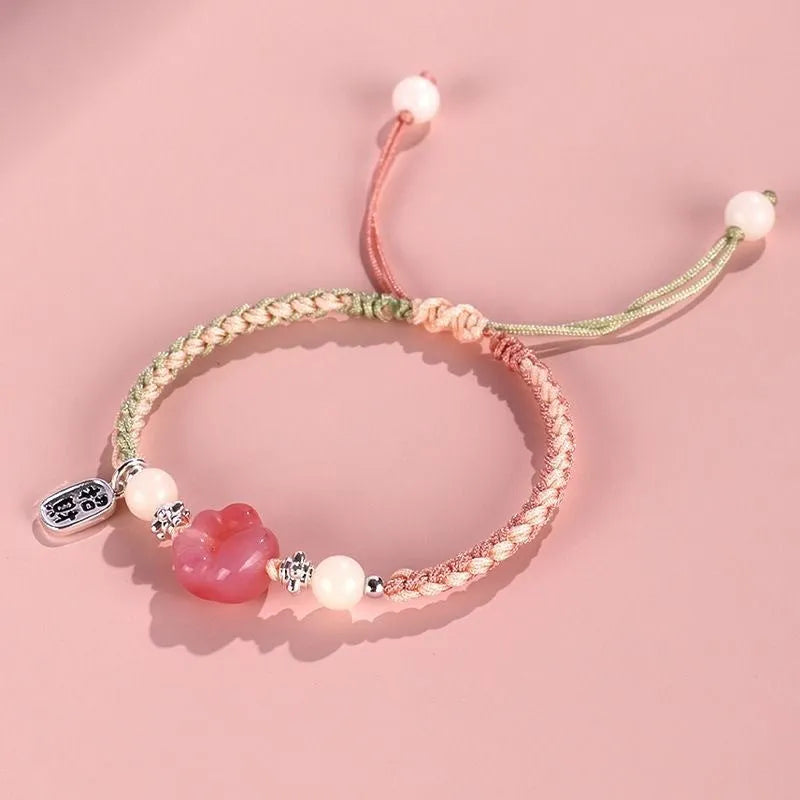 Red cat's paw woven bracelet handmade from glass and coloured glaze in pink or yellow couple style