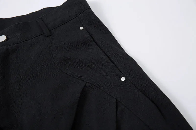 Men's black pleated casual trousers with wide-leg loose fit and mid waist design