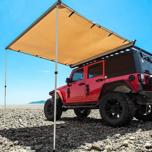 Black glue waterproof camping tent with aluminium poles set up outdoors showing two-bedroom interior