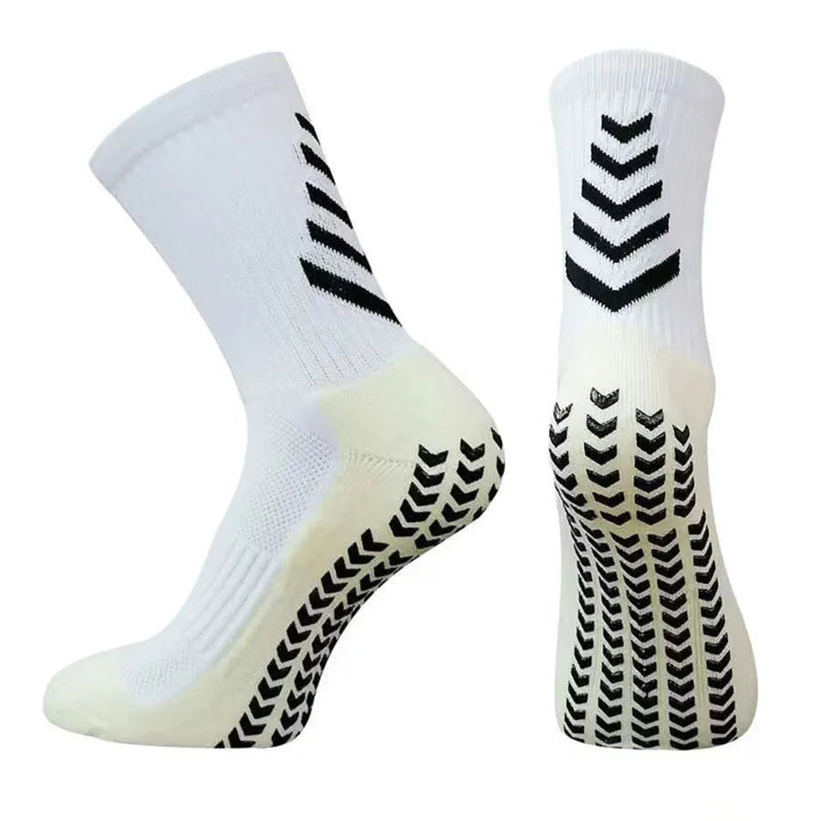 Men's black and green mid-calf athletic socks with a geometric pattern and non-slip silicone grip.