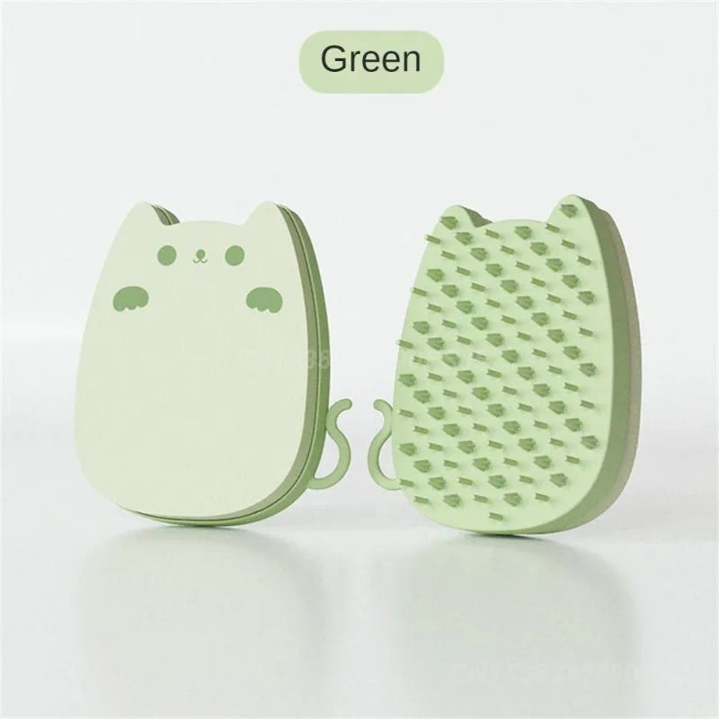 Blue silicone pet grooming comb sponge with dual-texture bristles on a white background.