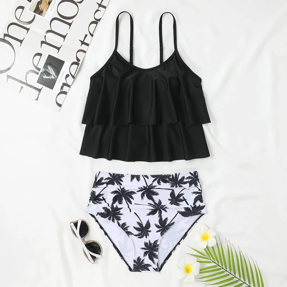 High waisted black and coconut tree print swimsuit top and bottom on a mannequin