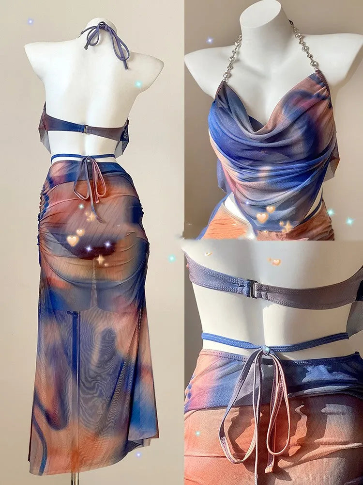 Women's blue printed three-piece bikini set with triangle top featuring steel wire support and a detachable skirt.