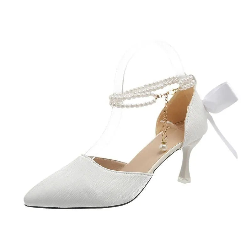Women's fairy bow high heels in apricot with 6cm wine glass heel, side view