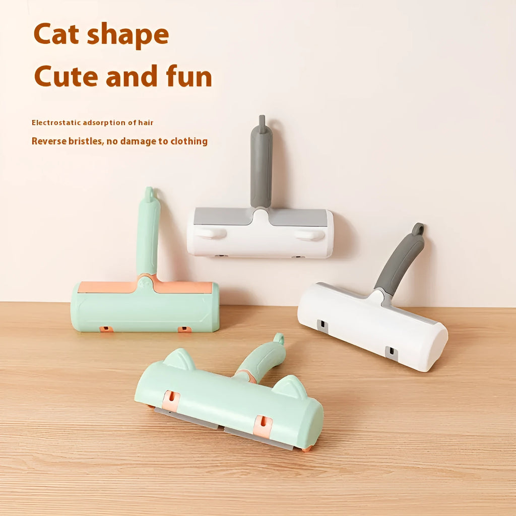 Mint green and twilight grey cat hair removal brush with two head style options on a white background.