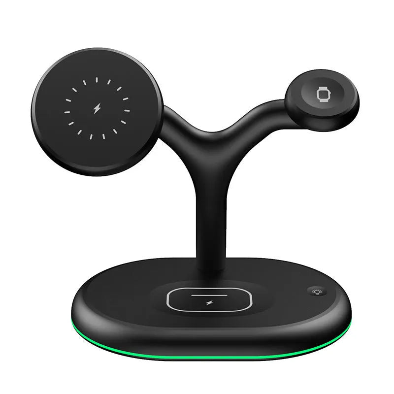 Black magnetic wireless charging stand holding a phone upright on a desk.