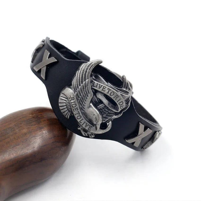 Black leather watch bracelet with geometric shape and a silver alloy eagle clasp.