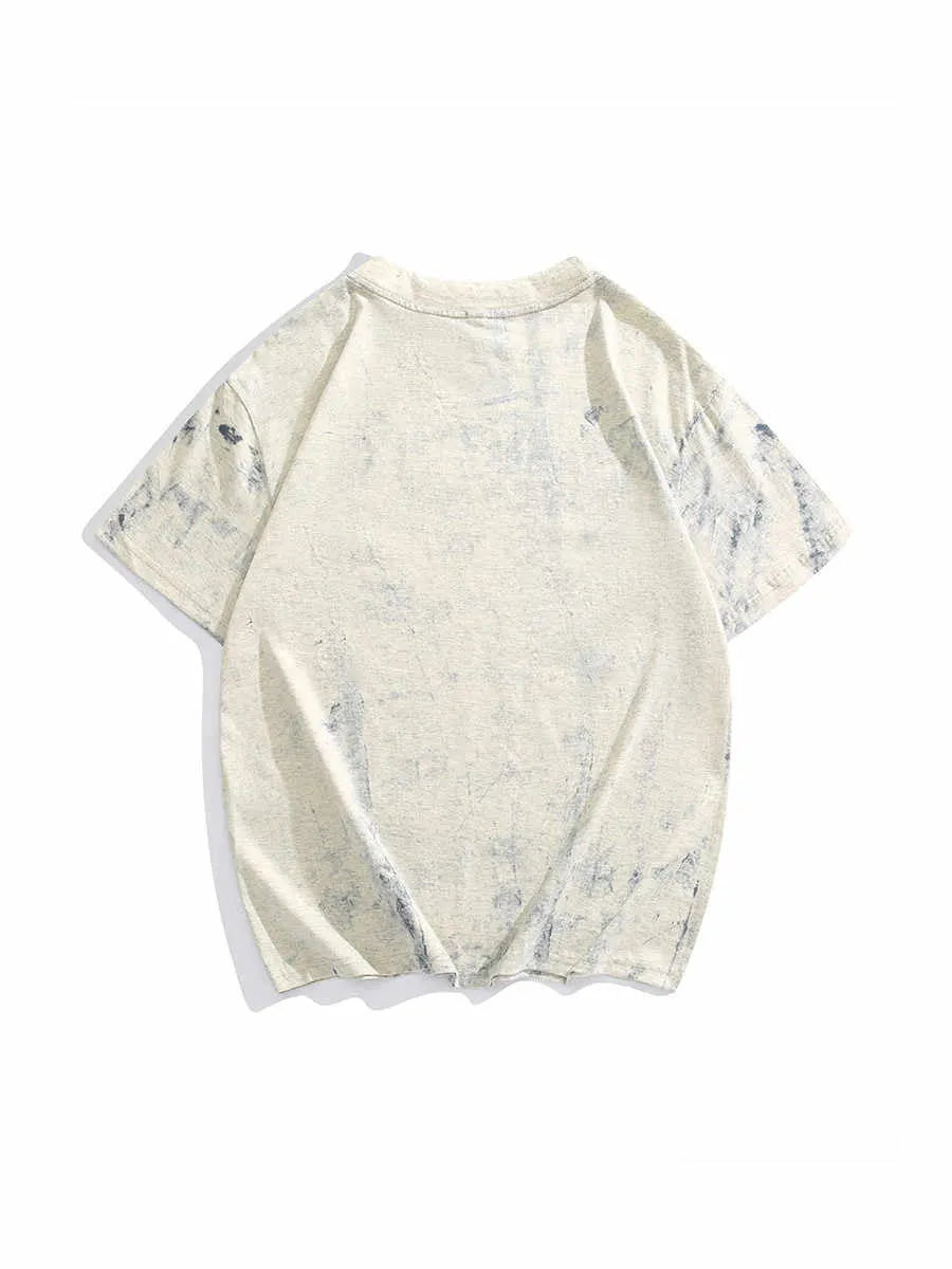 Grey loose fit t-shirt with an all-over tie dye print and short sleeves.
