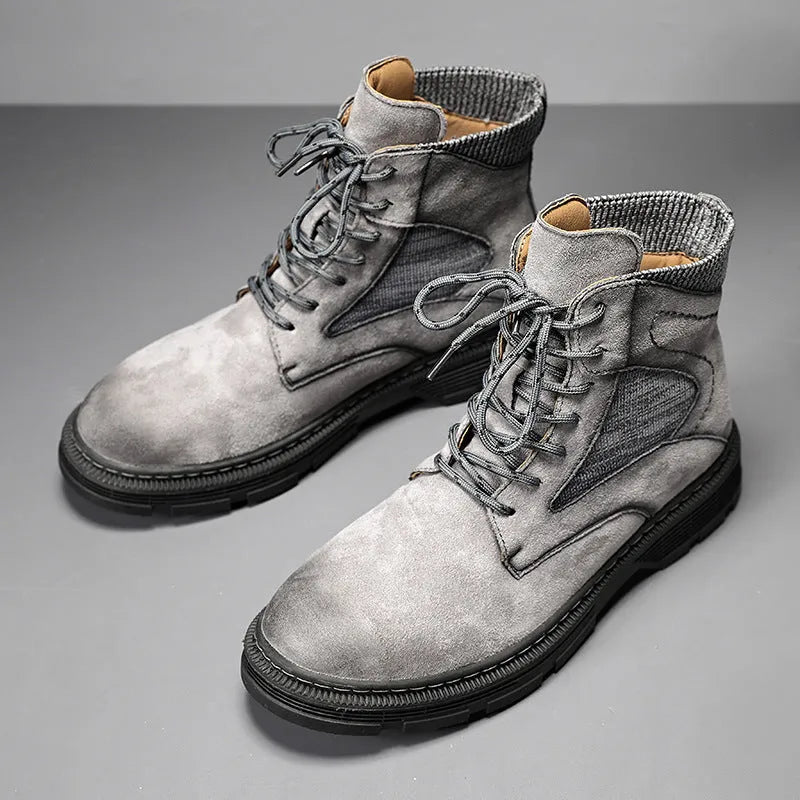 Men's ankle-high Martin boots in frosted sand leather with thick rubber sole and round toe.