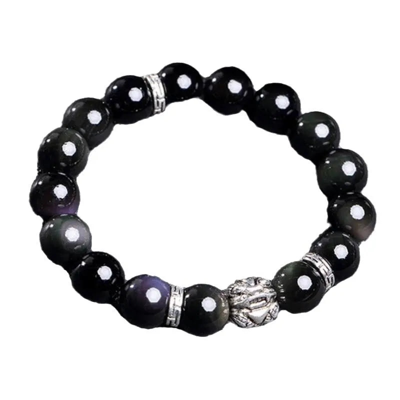 Obsidian bracelet with silver 999 settings showing natural cloud patterns in the beads