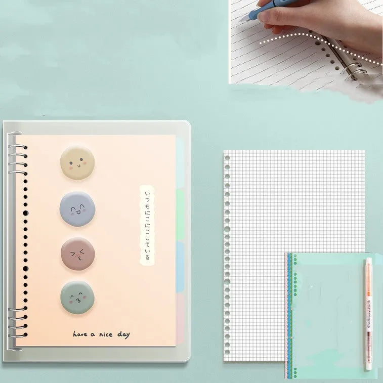 B5 hardcover detachable notebook open showing colour pages and binding system