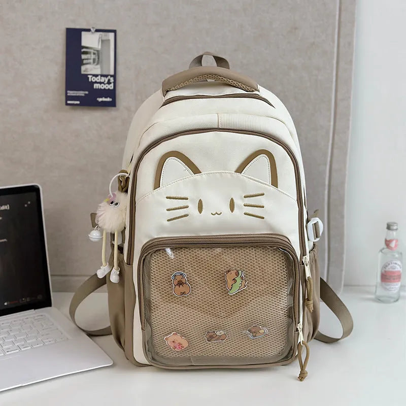 Korean cartoon backpack in multiple colours with curved shoulder straps and badge pendant options