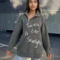 Women's light khaki alpaca wool retro sweater with an oblique zip and loose turtleneck collar.