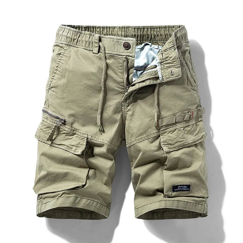 Men's army green cotton shorts with zipper and multiple pockets, shown in a Korean style fit.