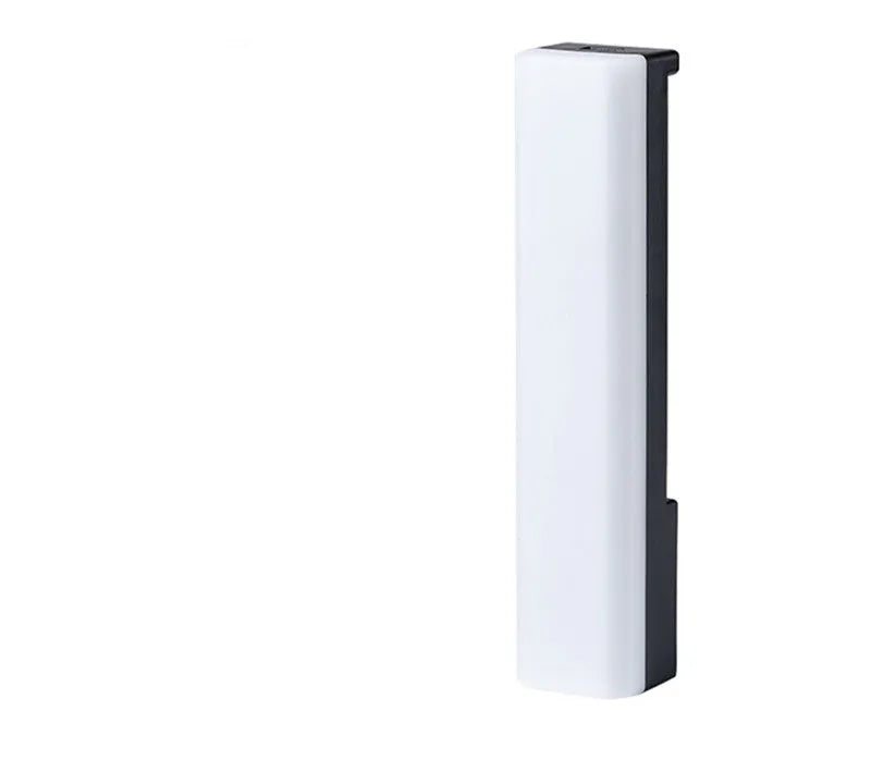 3D RGB music rhythm table lamp with voice control in black or white shell on a desk.