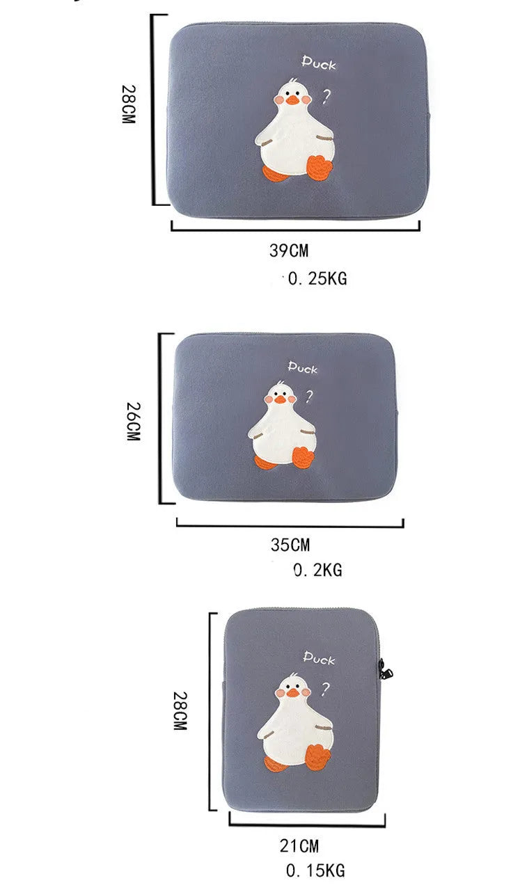 Blue cotton tablet case with embroidered cartoon duck design and a black zipper, shown open.