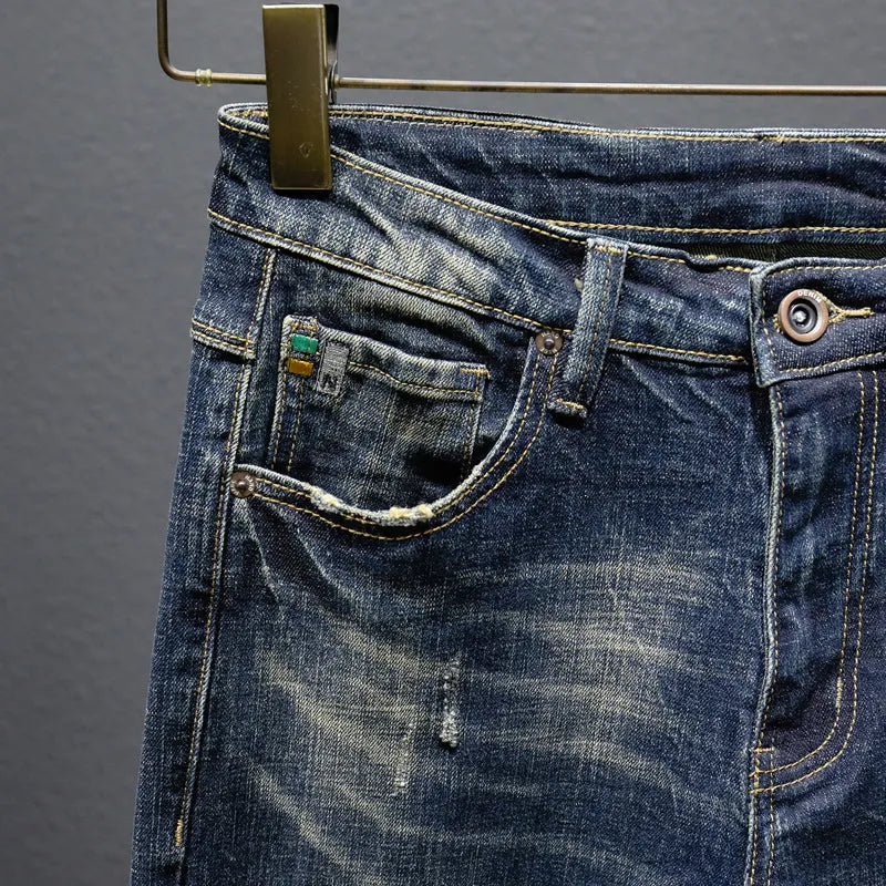 Men's slim straight stretch jeans in blue, mid waist, zip fly, red ear denim, sizes 28-38