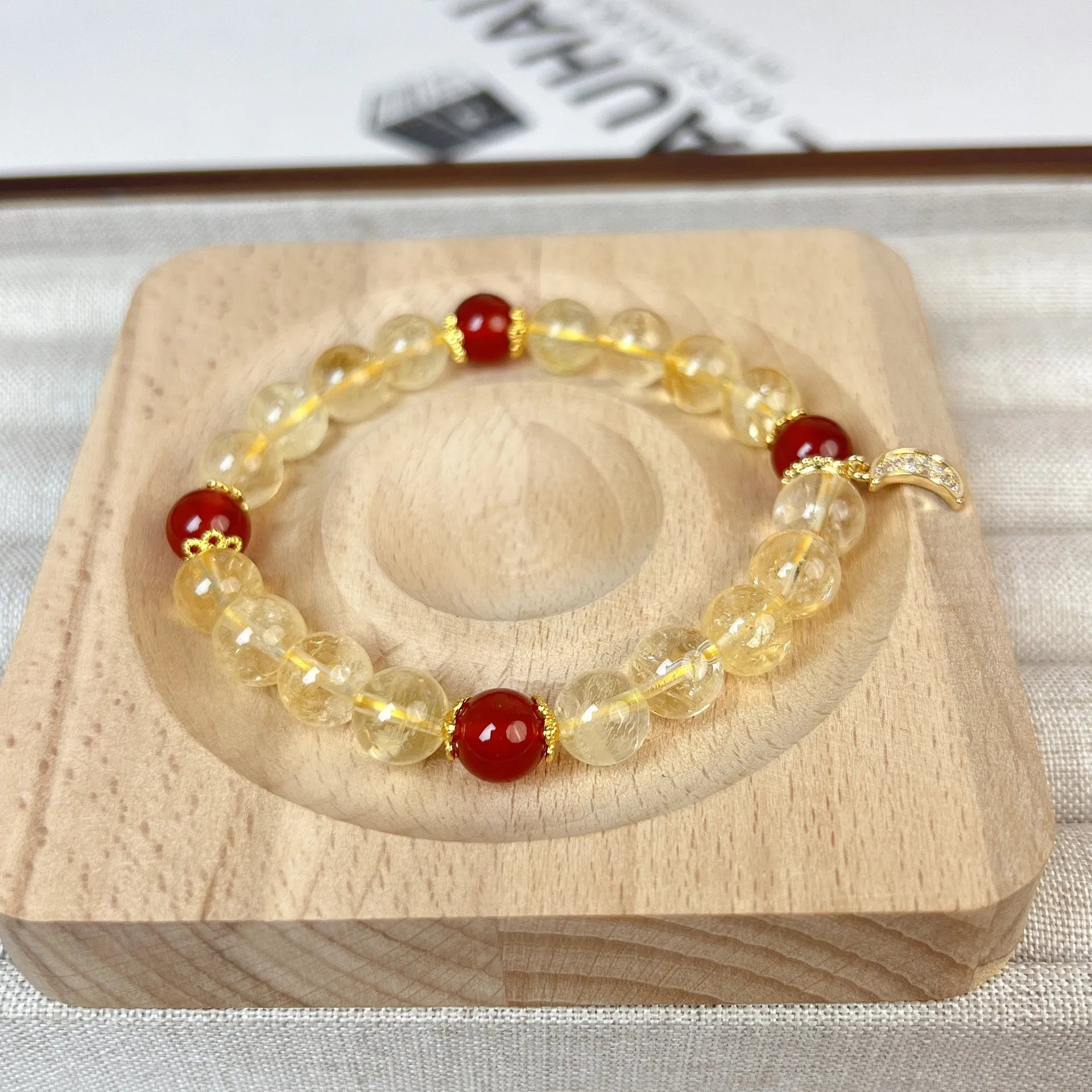 Citrine Red Agate Moon Boom Bracelet showing crystal stones and celestial charms