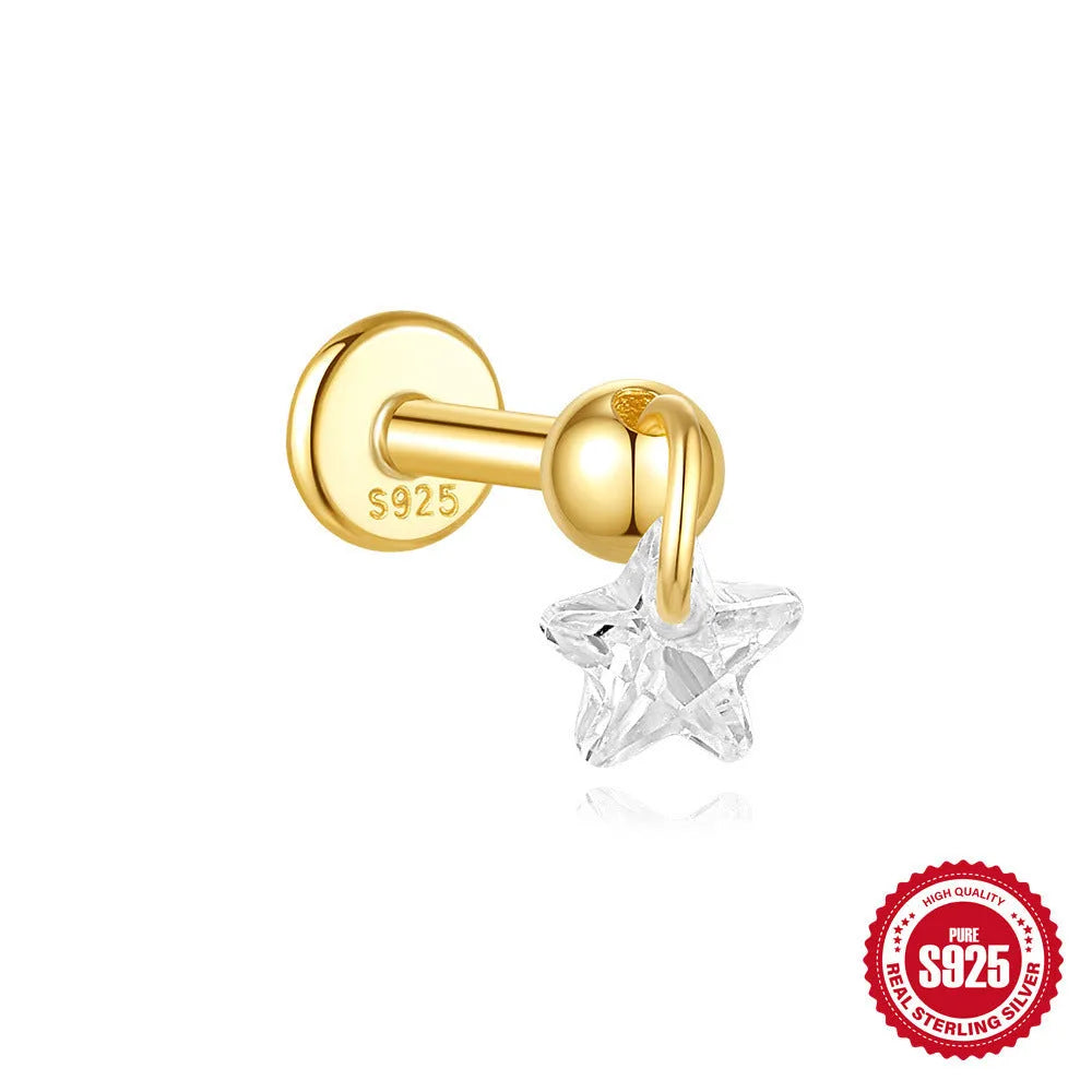 Geometric S925 sterling silver star and moon earrings with diamond accents in a gold colour.