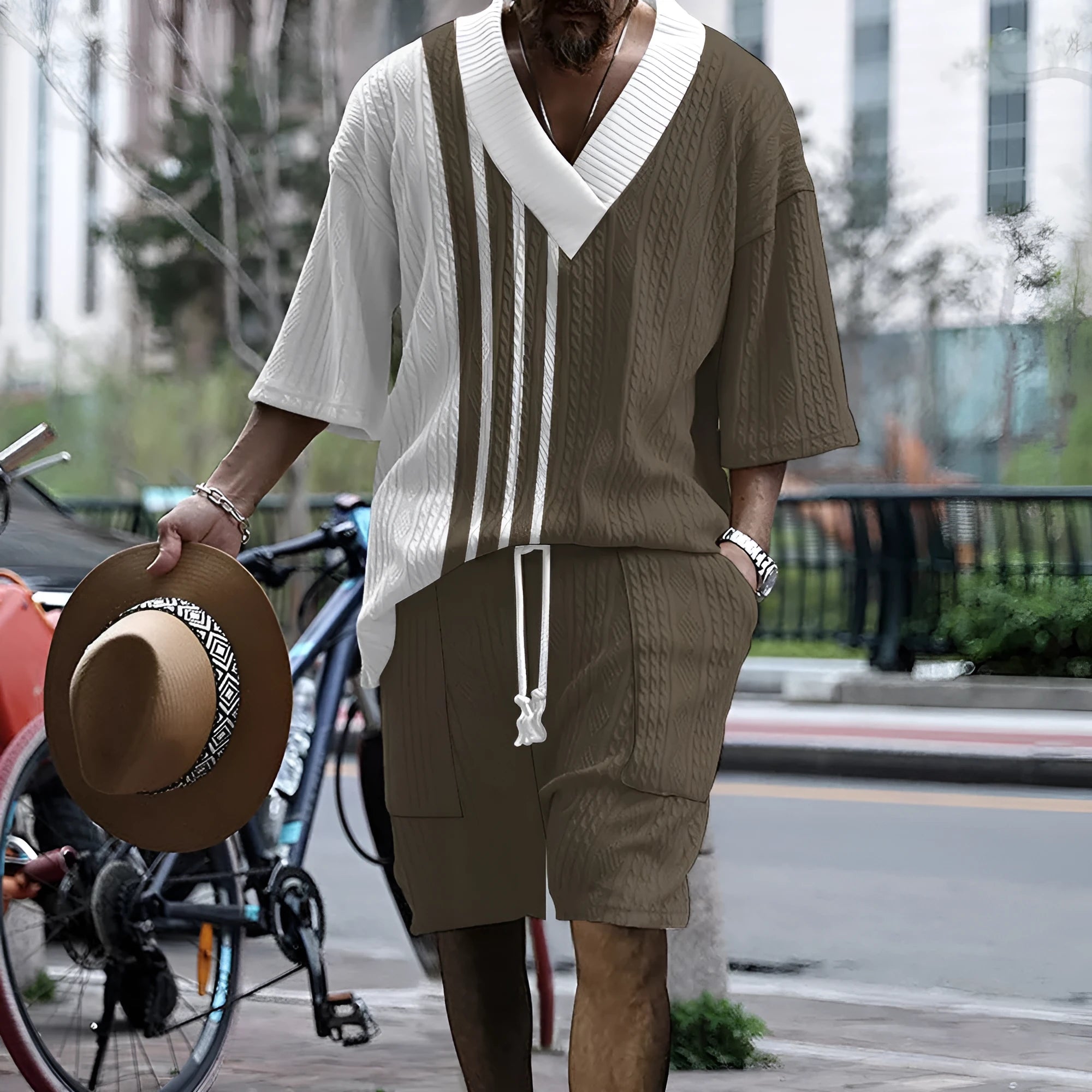 Men's knitted drop-shoulder short-sleeve top and matching shorts suit set on a mannequin.