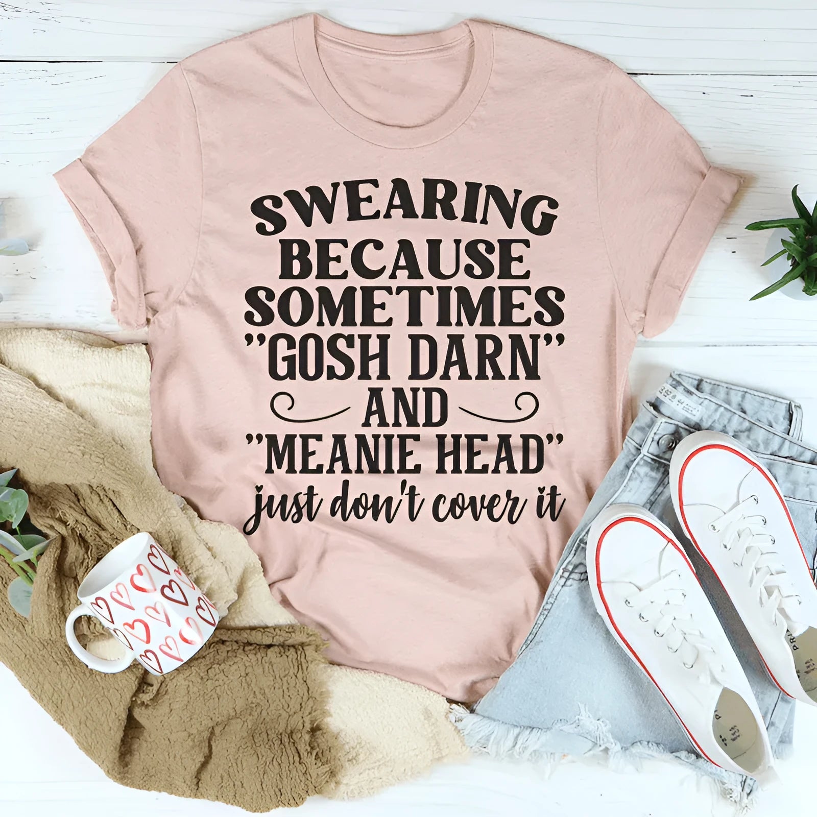 Pink couple's matching t-shirt with print, short sleeves, straight cut, on a hanger.