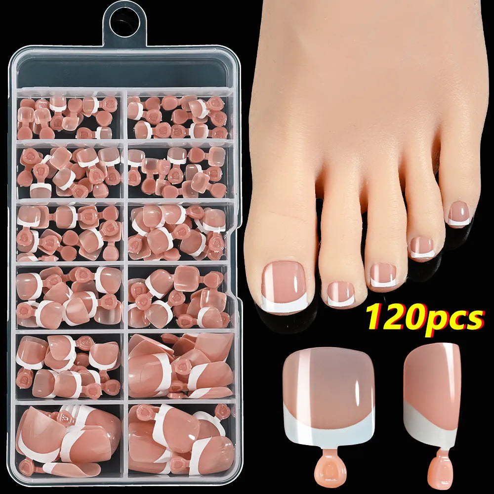 Open box showing 120 French white edge nude square false toe nail pieces in various shades.