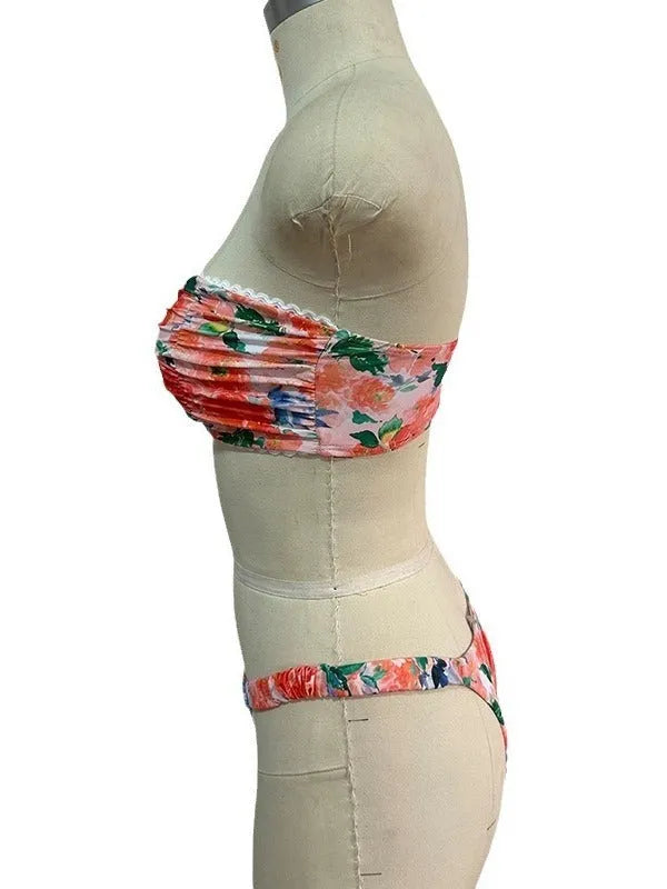 Blue floral print bikini set with lace trim on a sleeveless tube top and matching briefs.