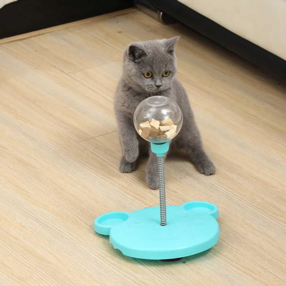 Plastic pet feeder toy with leaking food ball, swing tumbler body, suction cup base, Blue or Pink
