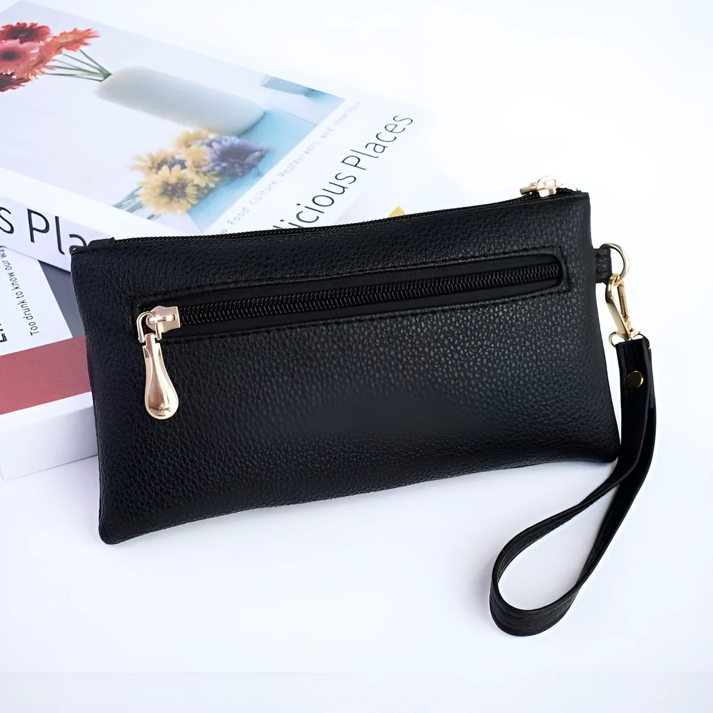 Soft PU leather crossbody bag in a square shape showing the internal sandwich zipper pocket.