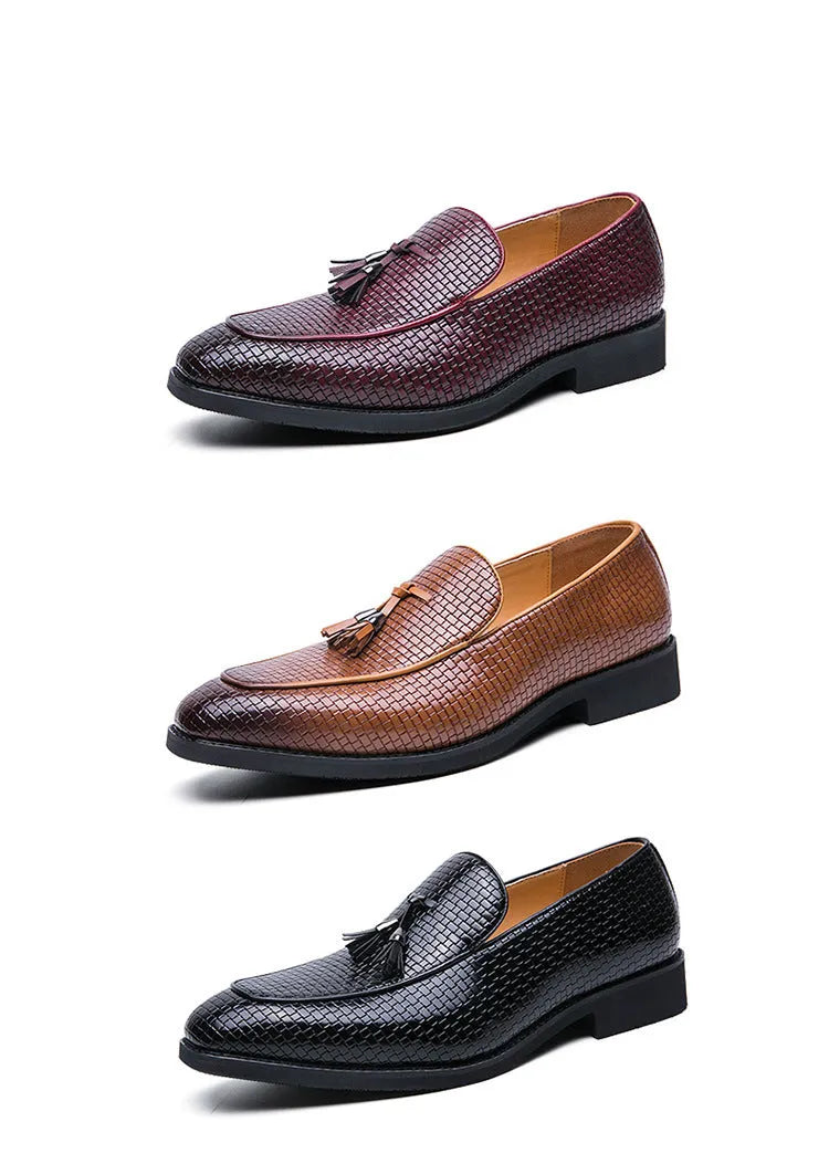Men's black pointed toe slip-on shoe with a tassel on the low-top PU upper.