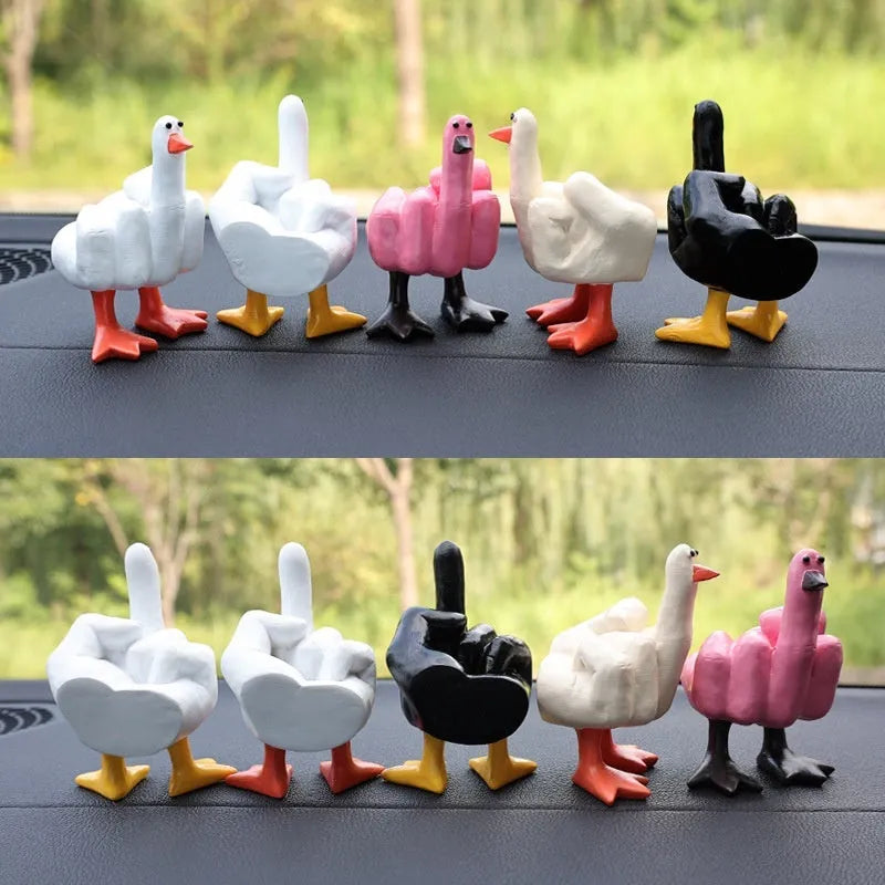 Creative vertical resin middle finger duck car ornament in pink on dashboard