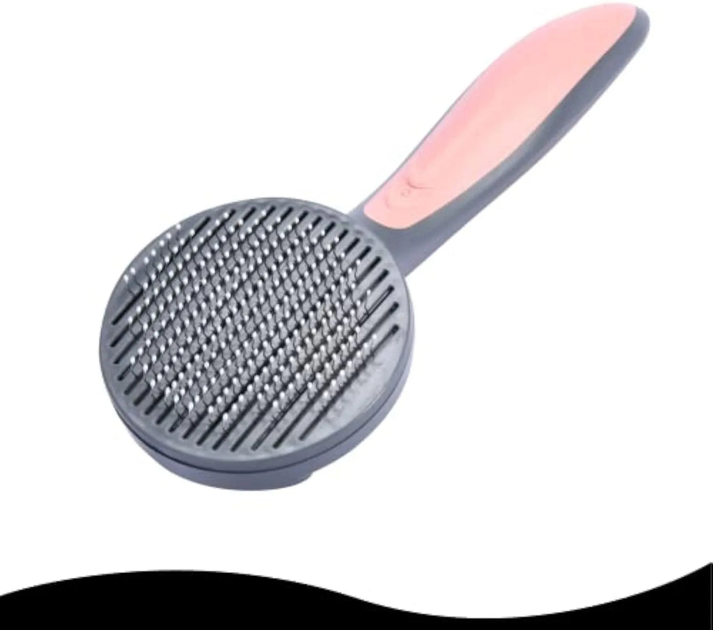 Grey self-cleaning slicker brush for grooming cats and dogs, showing the one-touch button and soft bristles.