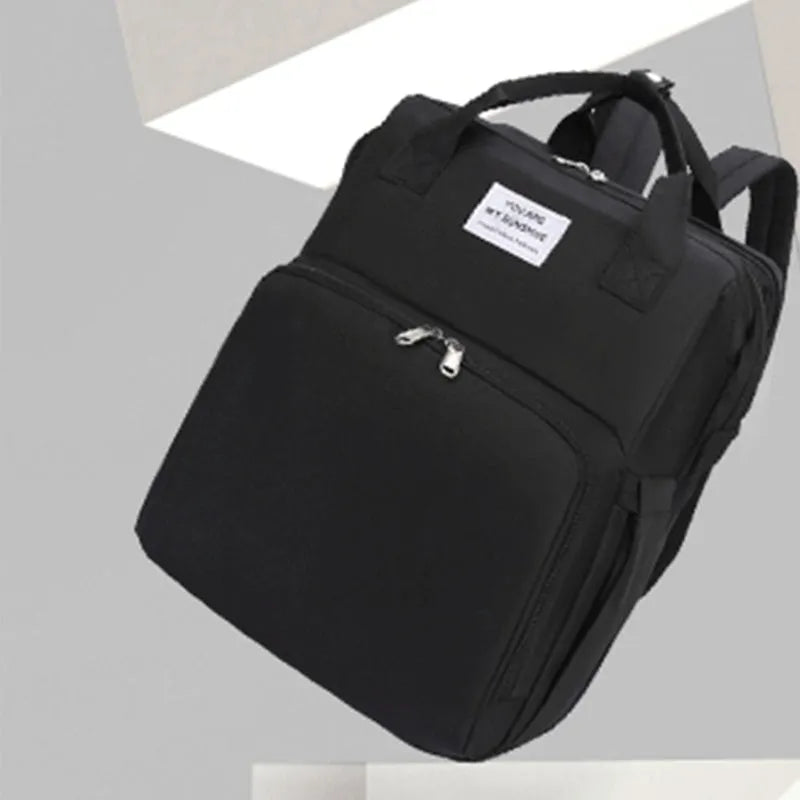 Lightweight nylon mother and baby bag with USB port, curved shoulder strap, shown in blue colour.