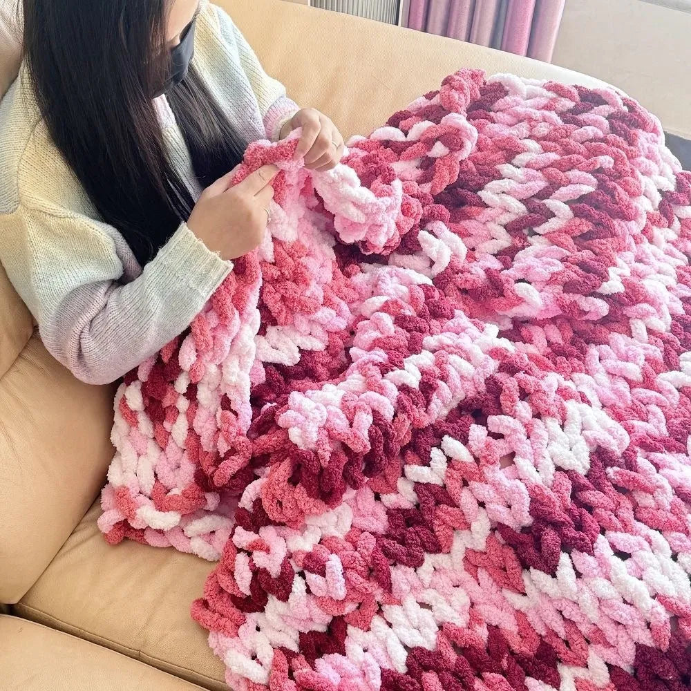 Coarse yarn chenille knitted blanket with braided gravity detail in modern colour option