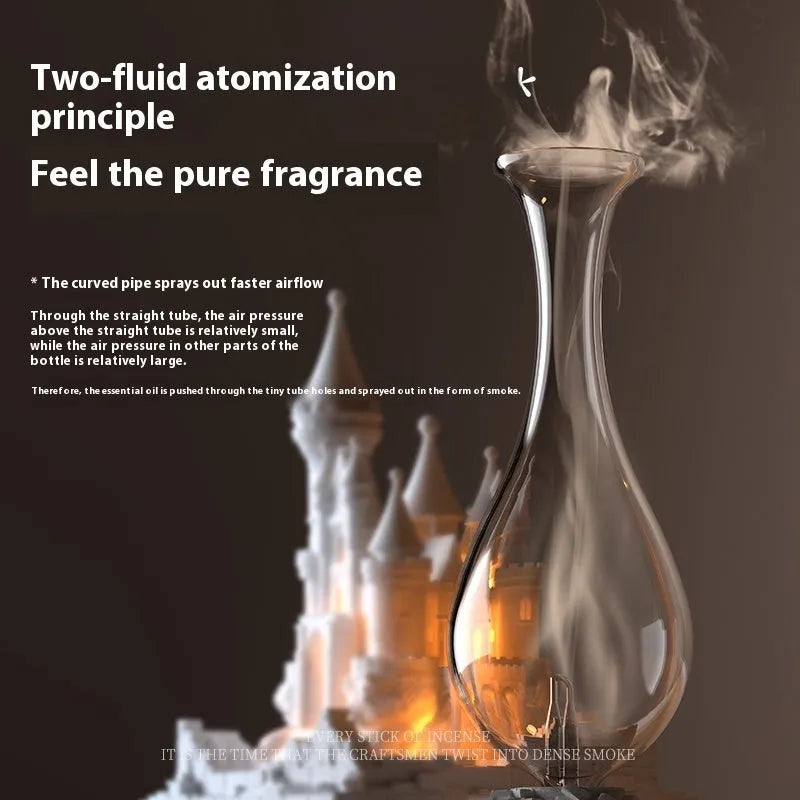 White medieval castle-shaped waterless cold fragrance diffuser with ambient lighting on a table.